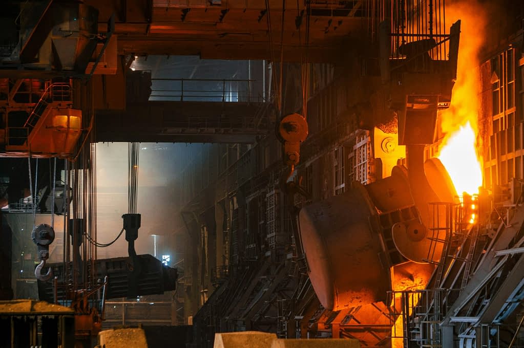 Steel factory Steel factory with molten furnace during steel production - Trump doubles steel and aluminum tariffs to 50 percent