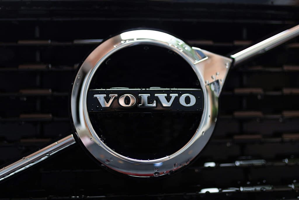 Volvo Volvo Cars logo on car grille - Swedish automaker changes strategy due to American tariffs and relocates production to USA