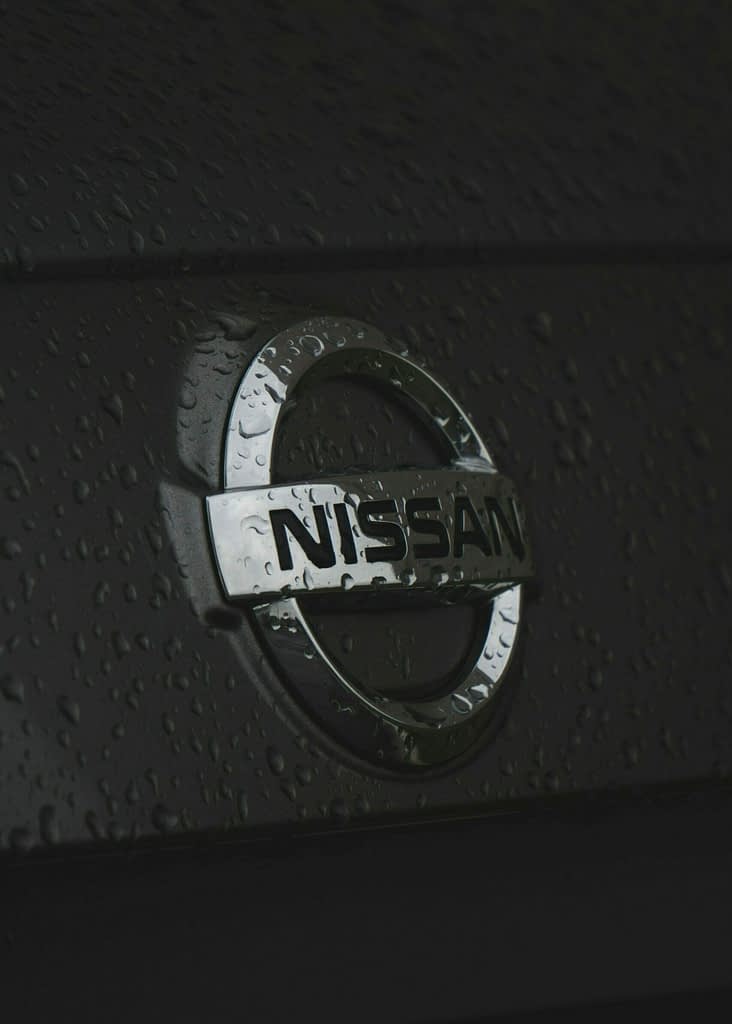 Nissan Wet Nissan logo with rain drops symbolizing financial storm of Japanese automaker during $7 billion restructuring plan